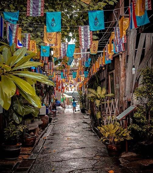 nation and King, the flags hanging in an old alley in Bangkok